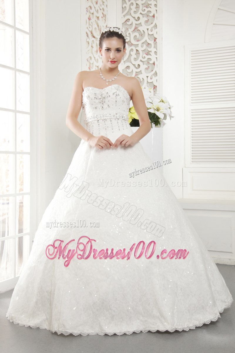 Sequins and Beadings Decorated Puffy Bridal Dress with Ruffled Hemline
