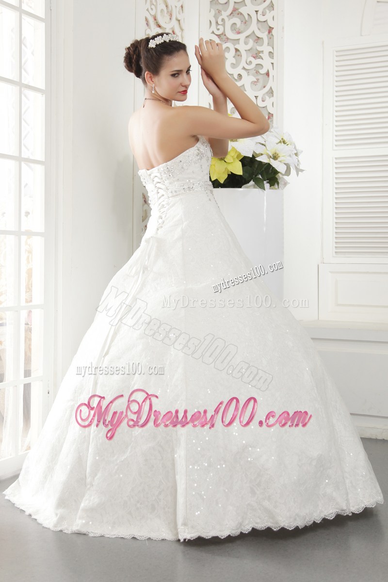 Sequins and Beadings Decorated Puffy Bridal Dress with Ruffled Hemline