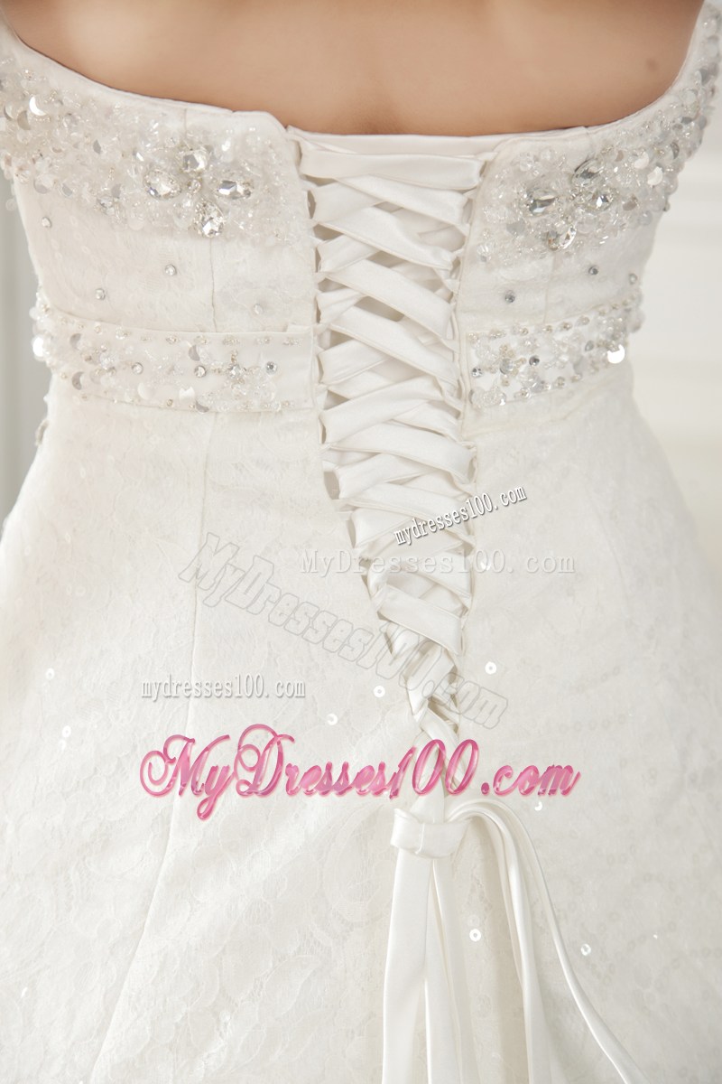 Sequins and Beadings Decorated Puffy Bridal Dress with Ruffled Hemline