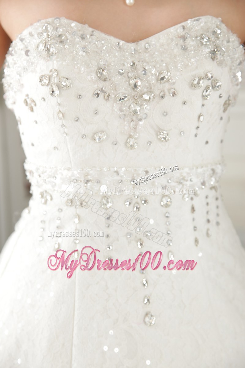 Sequins and Beadings Decorated Puffy Bridal Dress with Ruffled Hemline