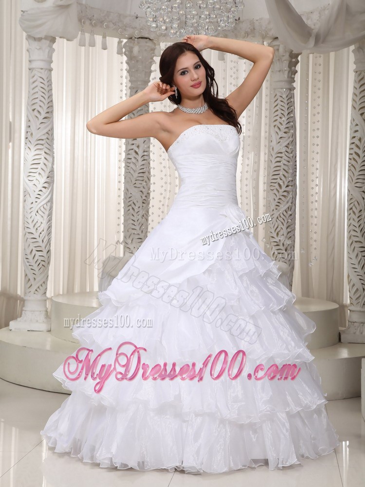 Flowers and Ruffled Layers Floor-length Strapless Beaded Bridal Gown