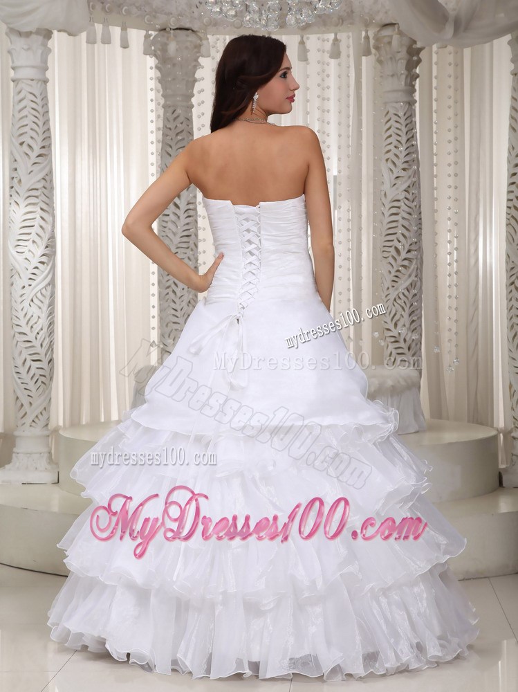 Flowers and Ruffled Layers Floor-length Strapless Beaded Bridal Gown