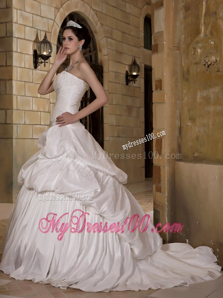 Puffy Pick-ups Sweep Train Wedding Dresses Decorated with Ruching and Beading