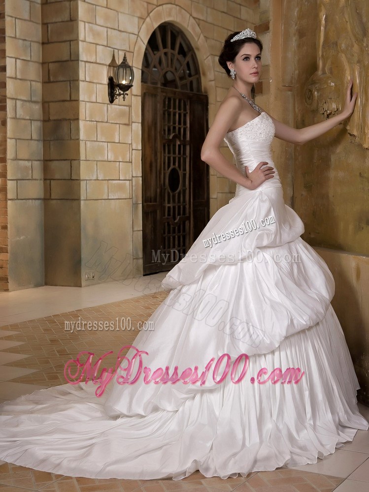 Puffy Pick-ups Sweep Train Wedding Dresses Decorated with Ruching and Beading