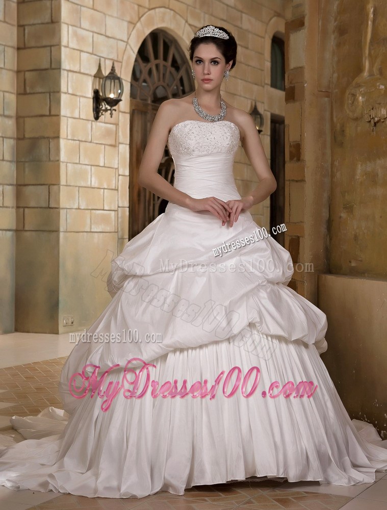 Puffy Pick-ups Sweep Train Wedding Dresses Decorated with Ruching and Beading