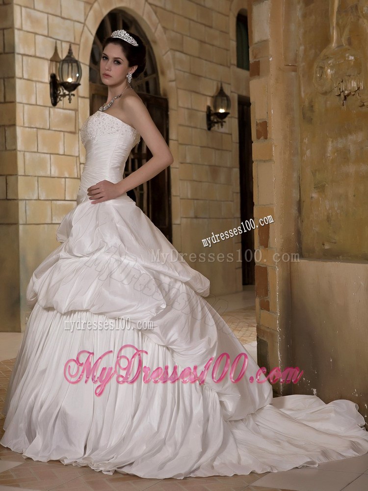 Puffy Pick-ups Sweep Train Wedding Dresses Decorated with Ruching and Beading