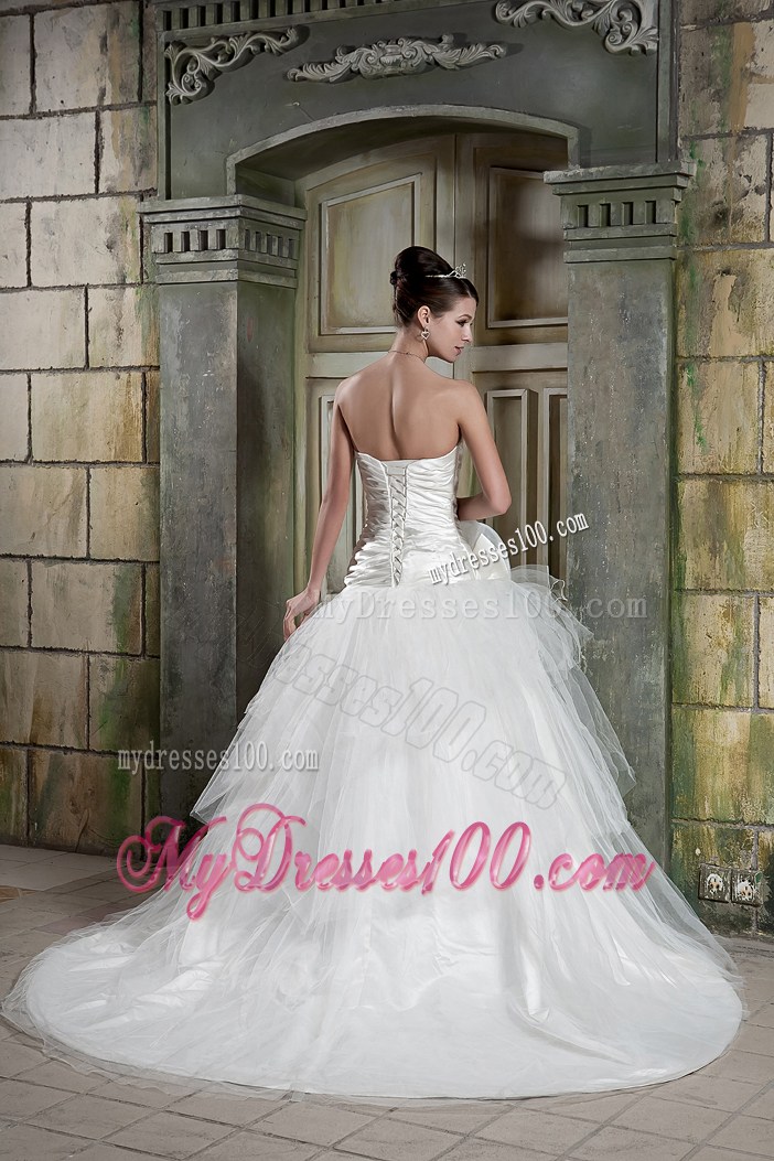 Ruched Tiers Sweep train Tulle Bridal Dresses Decorated with A Beading Petal
