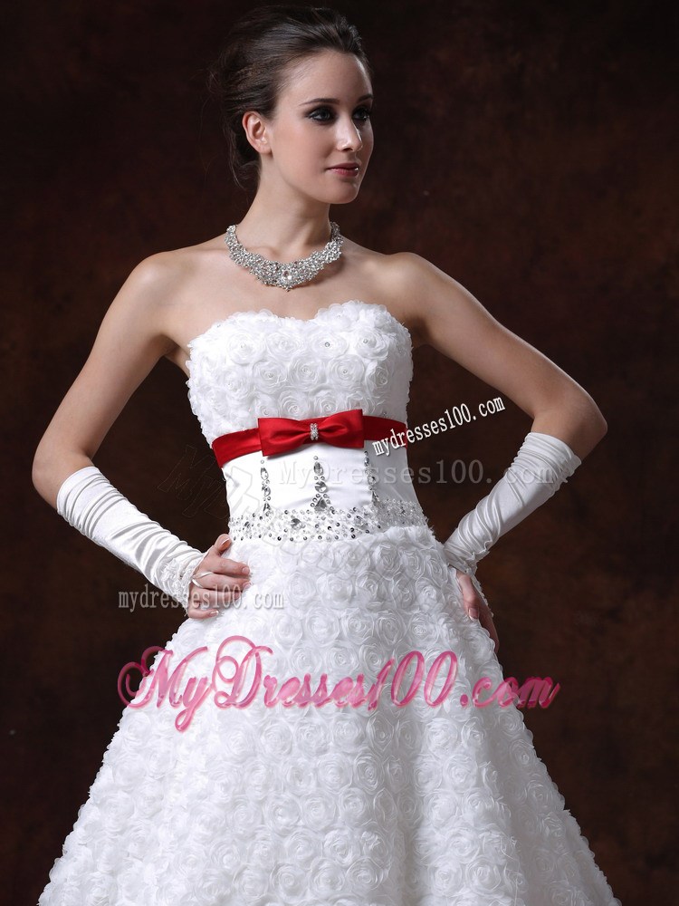 Lace-up Brush Wedding Gown with Rolling Flowers and Red Bowknot Sash