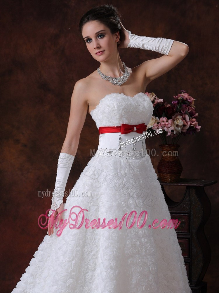 Lace-up Brush Wedding Gown with Rolling Flowers and Red Bowknot Sash