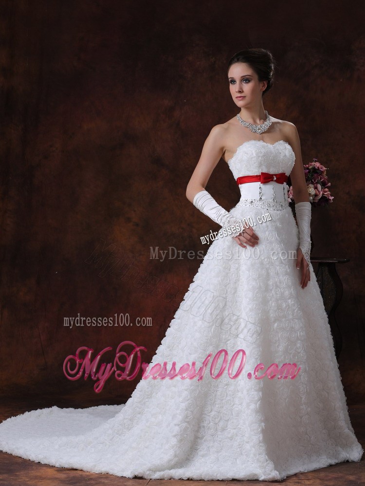 Lace-up Brush Wedding Gown with Rolling Flowers and Red Bowknot Sash