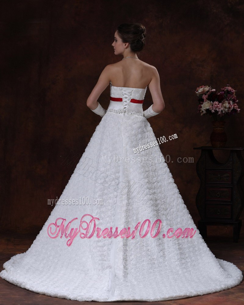 Lace-up Brush Wedding Gown with Rolling Flowers and Red Bowknot Sash