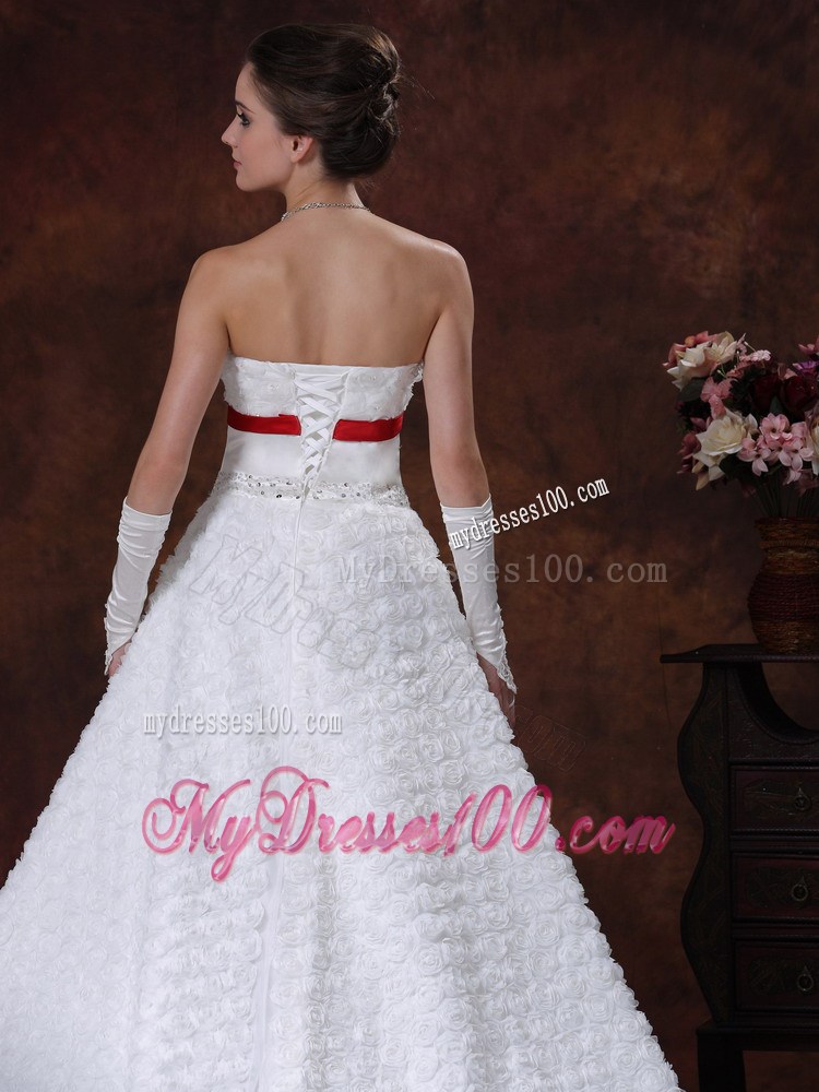 Lace-up Brush Wedding Gown with Rolling Flowers and Red Bowknot Sash