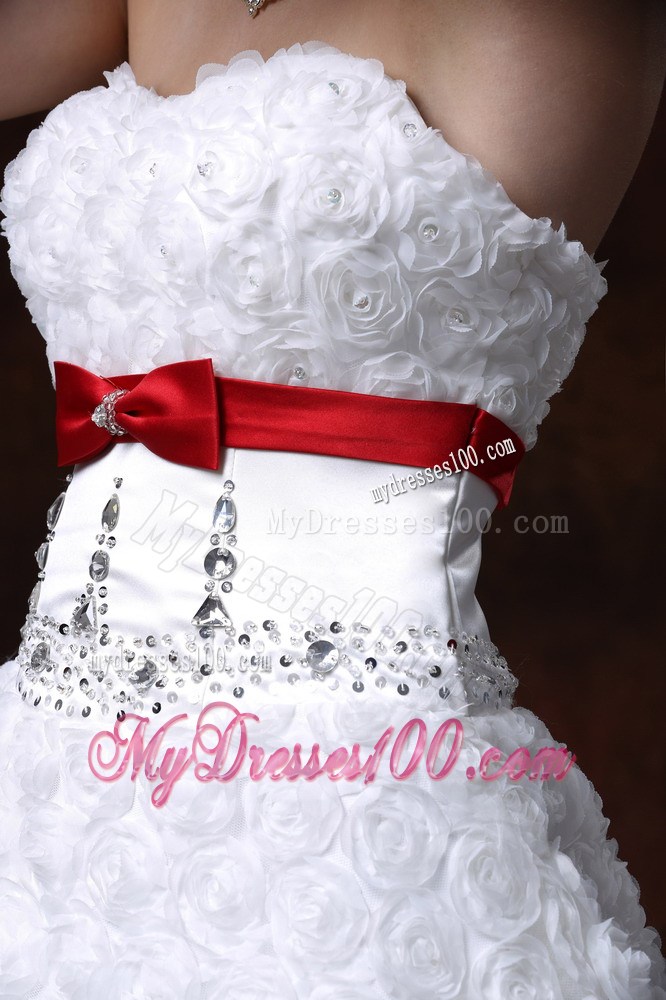 Lace-up Brush Wedding Gown with Rolling Flowers and Red Bowknot Sash