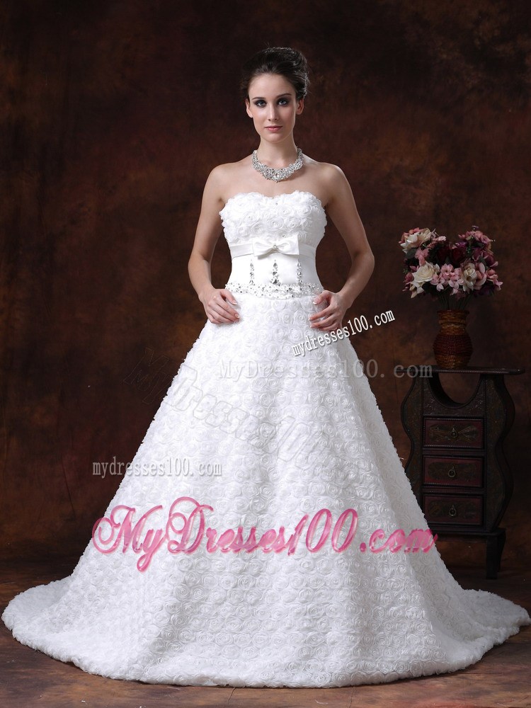 Bowknot and Rolling Flowers Accent on Beaded Wedding Gown Brush Train