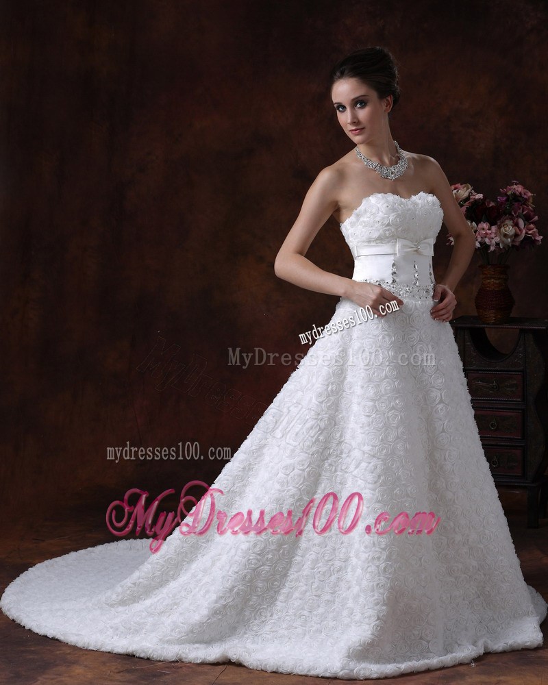 Bowknot and Rolling Flowers Accent on Beaded Wedding Gown Brush Train