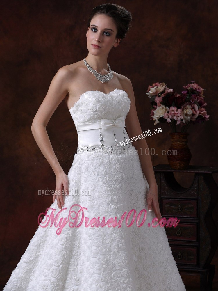 Bowknot and Rolling Flowers Accent on Beaded Wedding Gown Brush Train