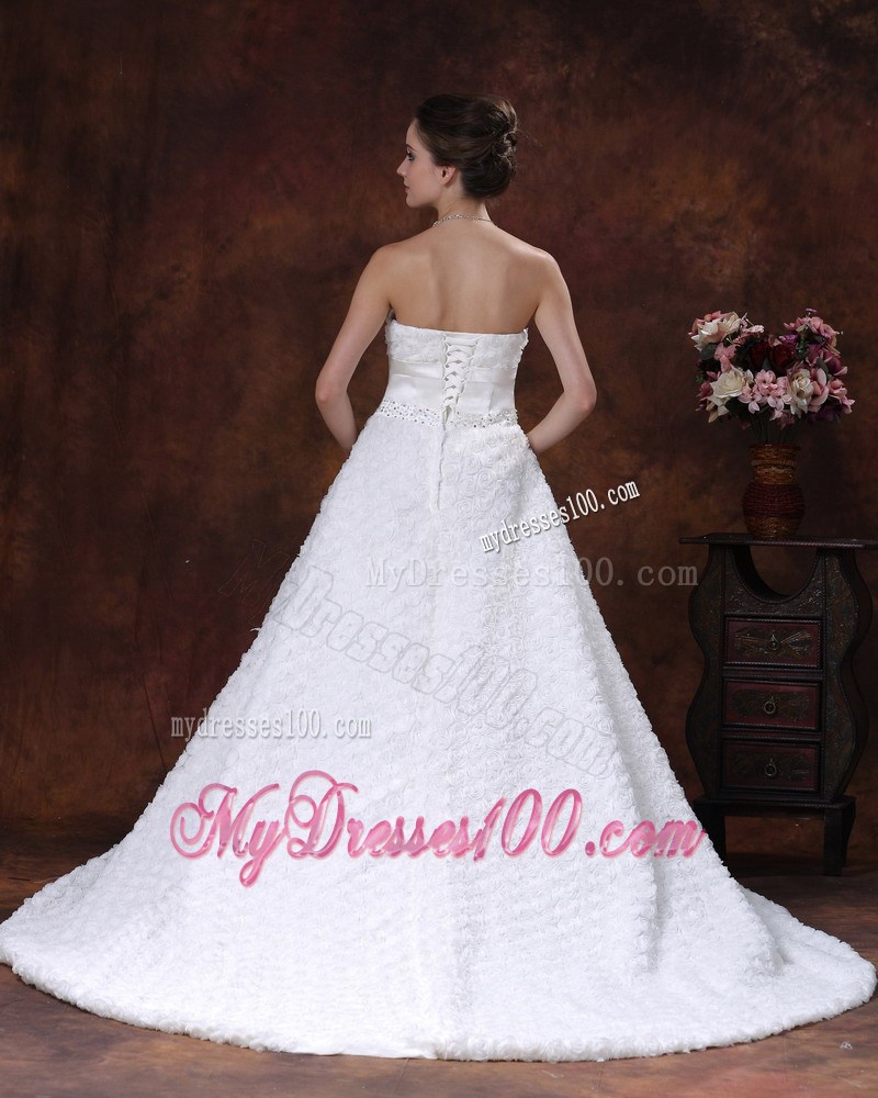 Bowknot and Rolling Flowers Accent on Beaded Wedding Gown Brush Train