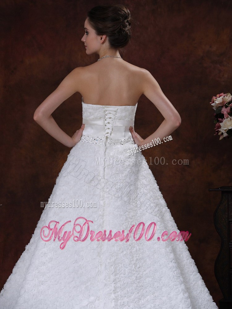 Bowknot and Rolling Flowers Accent on Beaded Wedding Gown Brush Train