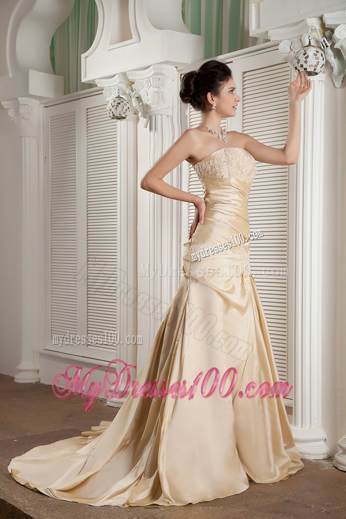 Trendy Appliqued and Ruched Champagne Princess Prom Gowns with Court Train