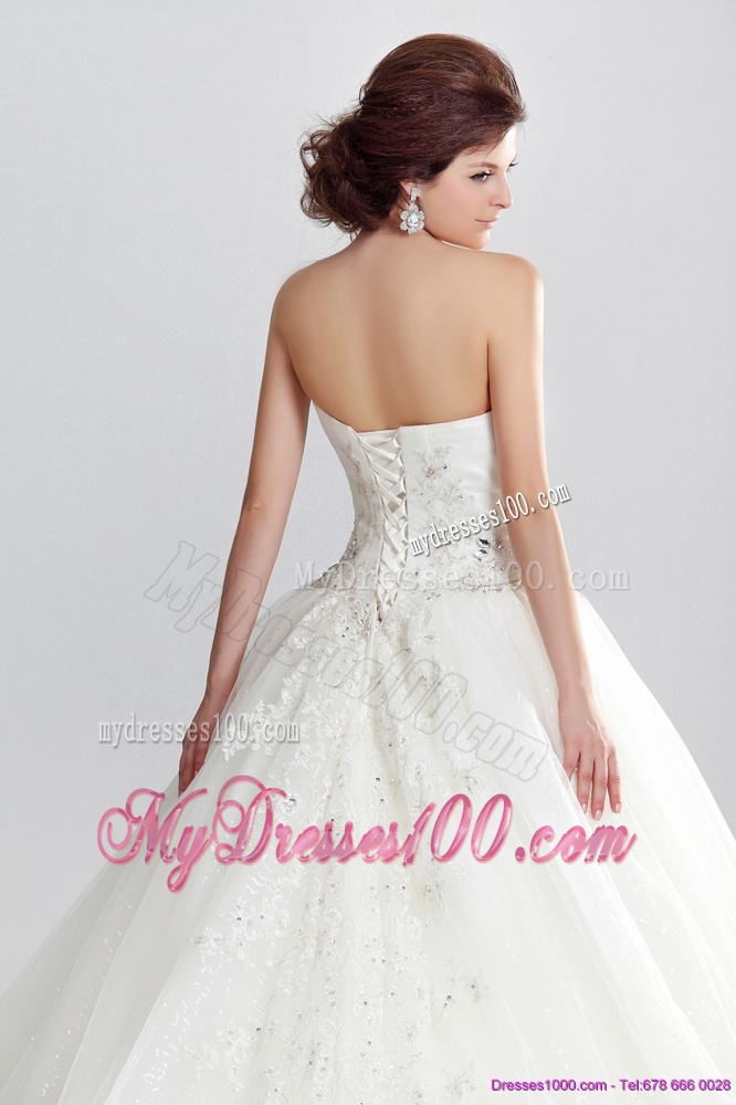 Unique White Sweetheart Bridal Gowns with Appliques and Brush Train