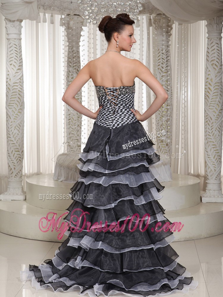 High-Low Hand Made Flowers Decorated Black Prom Gown with Ruffled Layers