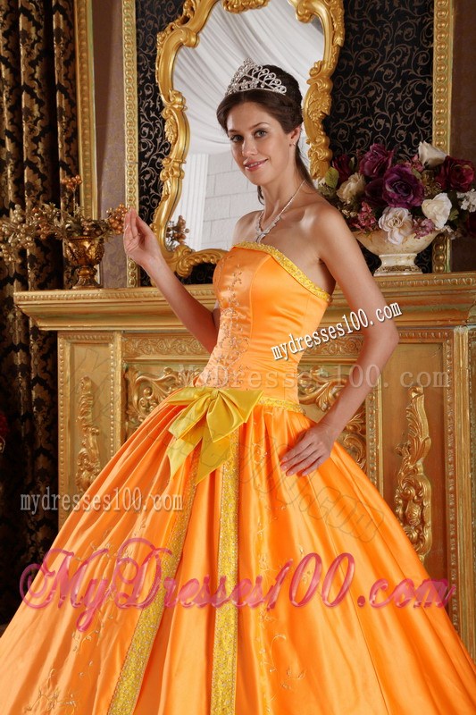 Puffy Quinceanera Dress in Orange Decorated with Bowknots and Appliques