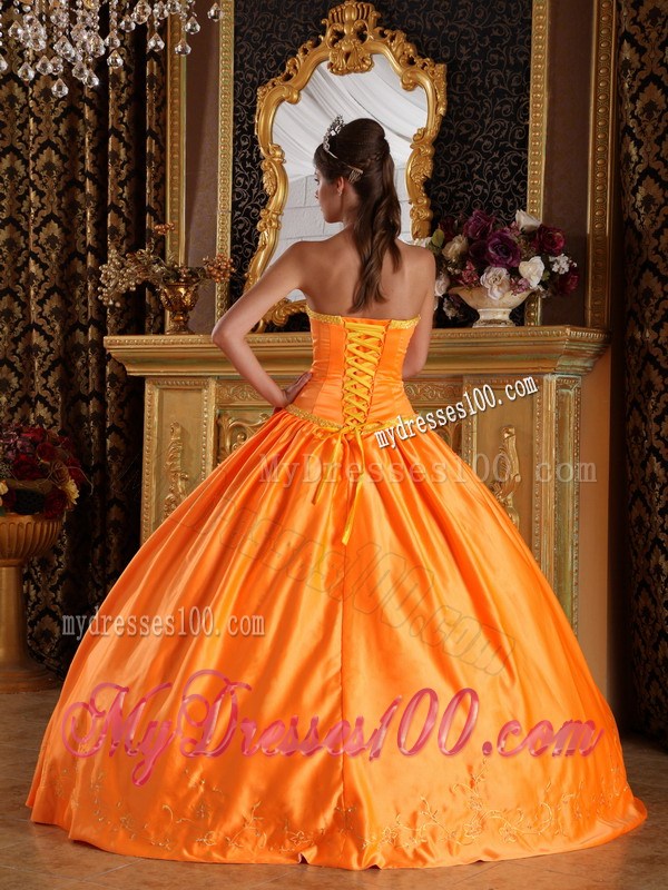 Puffy Quinceanera Dress in Orange Decorated with Bowknots and Appliques