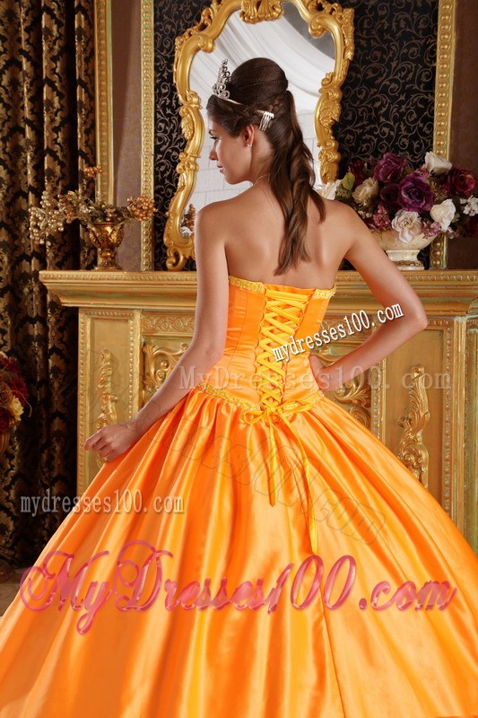Puffy Quinceanera Dress in Orange Decorated with Bowknots and Appliques