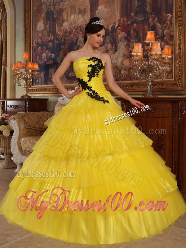 Shining Yellow Quinceanera Dress with Layers and Black Appliques