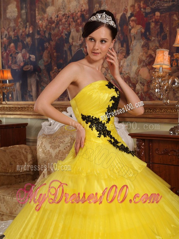 Shining Yellow Quinceanera Dress with Layers and Black Appliques