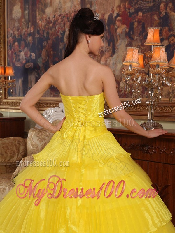 Shining Yellow Quinceanera Dress with Layers and Black Appliques