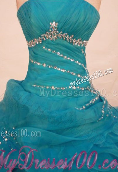 Teal Ball Gown Strapless Quinceanera Dress with Ruffled Layers