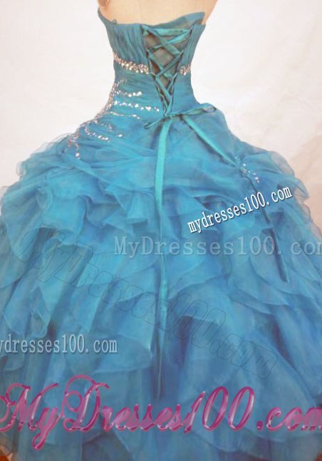 Teal Ball Gown Strapless Quinceanera Dress with Ruffled Layers