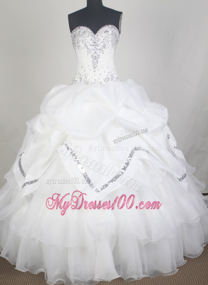 Innocent Pick-ups and Layers Decorate White Quinceanera Dress