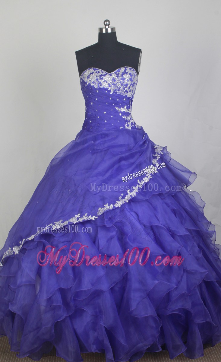 Appliqued and Ruffled Purple Quinceanera Gowns with Drapped Skirt