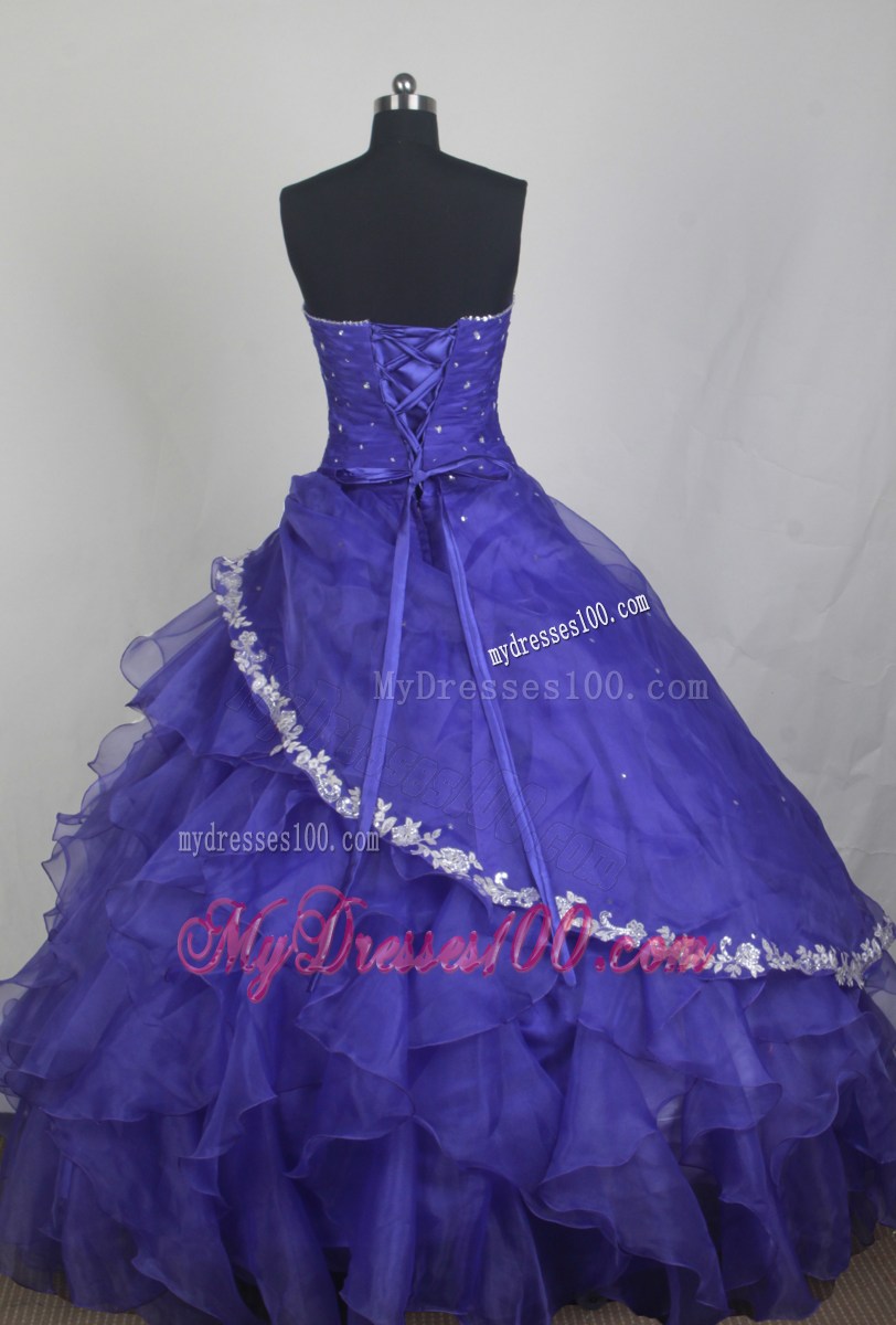 Appliqued and Ruffled Purple Quinceanera Gowns with Drapped Skirt