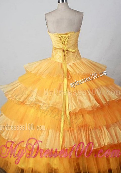 Outstanding Gold Tiers of Ruffles Quinceanera Dresses with Black Appliques