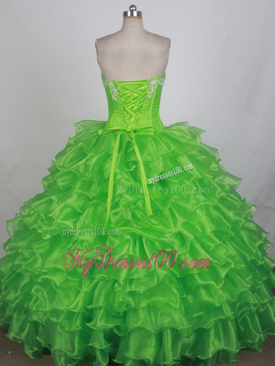 Appliques and Ruffled Layers Decorate Quinceanera Dress in Spring Green