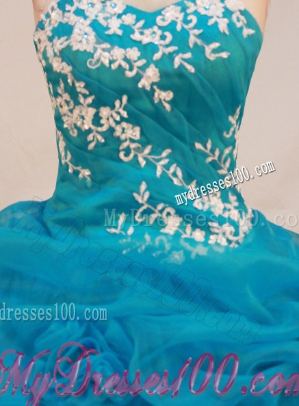 Puffy Sweetheart Appliques and Rhinestones Decorate Ruffled Sweet 16 Dress