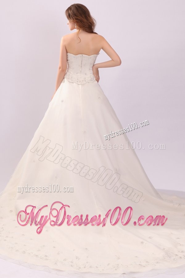 Luxurious Strapless A-line Embroidery Chapel Train Wedding Dress