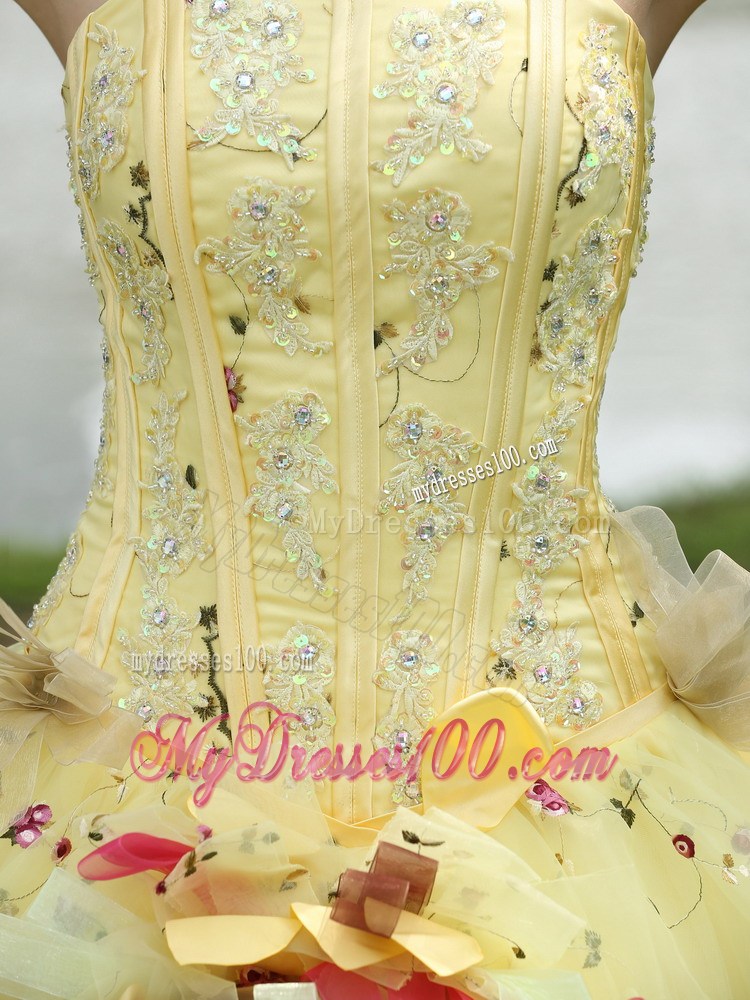 Beaded Yellow Quinceanera Dress with Colored Embroidery and Flower