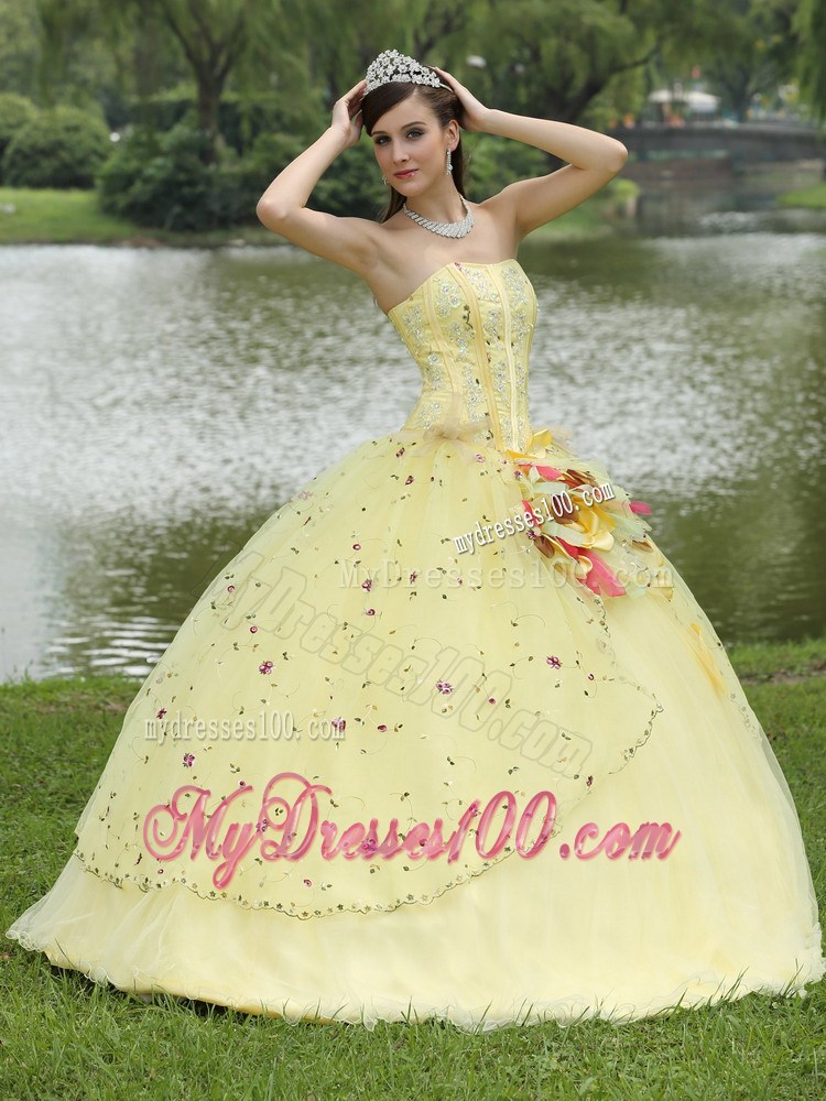 Beaded Yellow Quinceanera Dress with Colored Embroidery and Flower