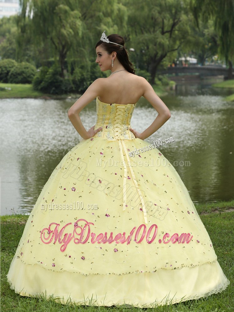 Beaded Yellow Quinceanera Dress with Colored Embroidery and Flower