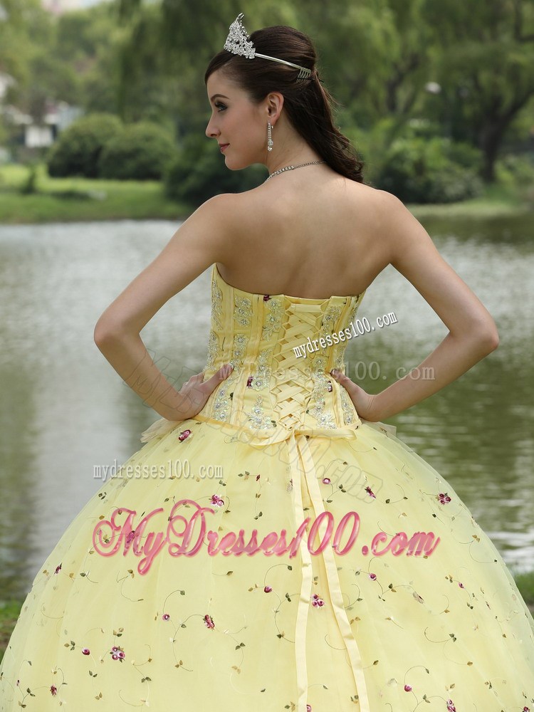 Beaded Yellow Quinceanera Dress with Colored Embroidery and Flower