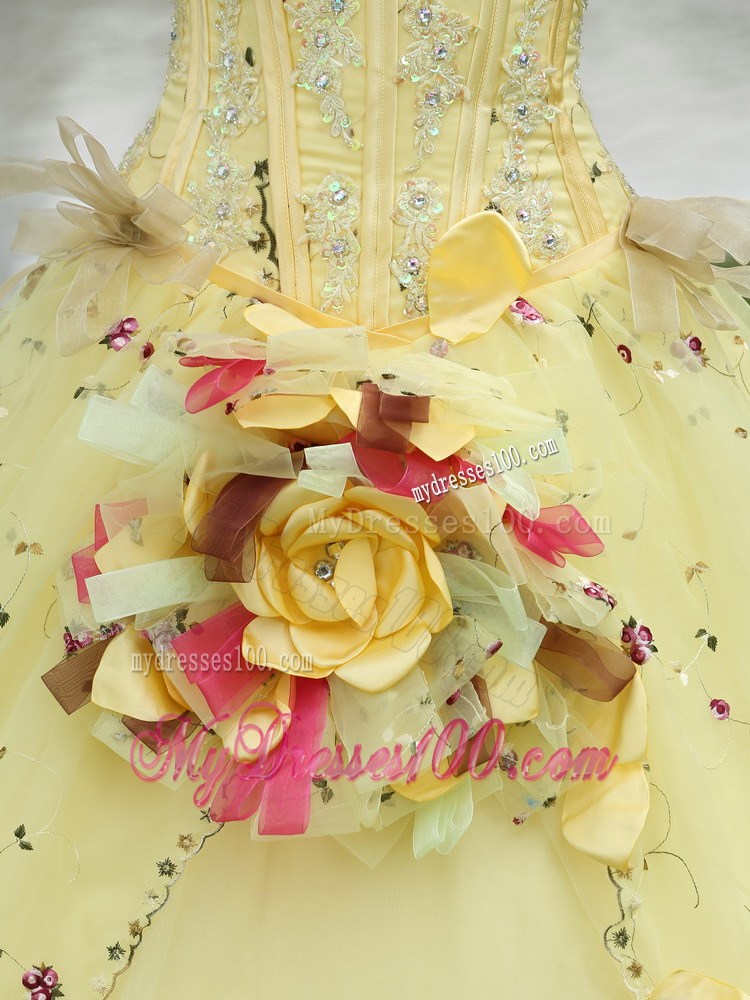 Beaded Yellow Quinceanera Dress with Colored Embroidery and Flower