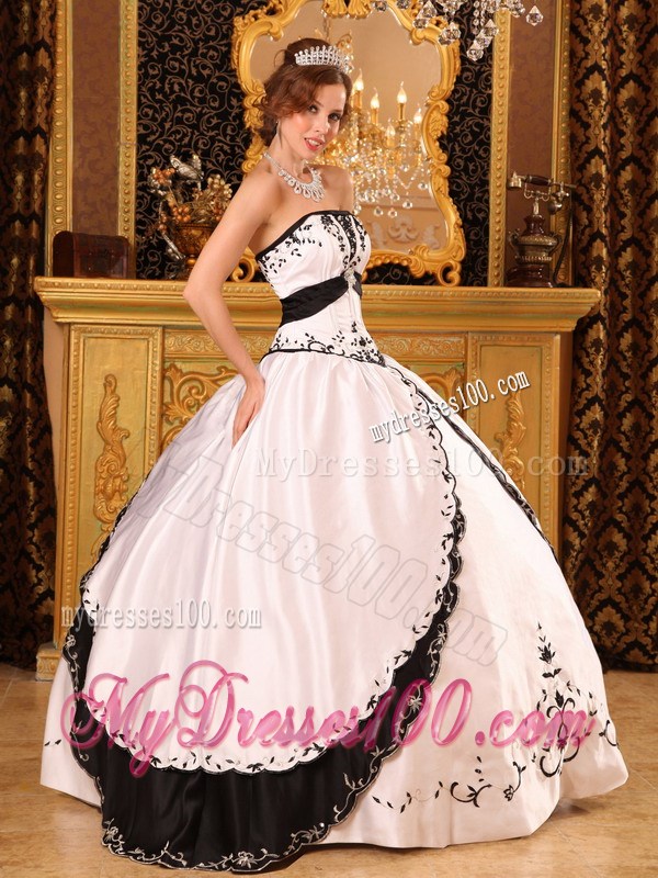 Black and White Satin Quinceanera Dresses with Embroidery and Layers