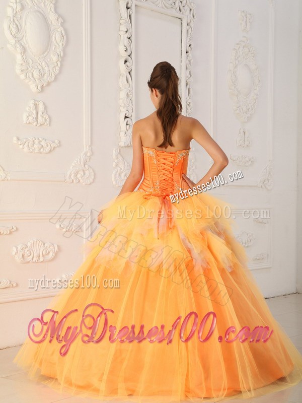 Orange A-line Appliques Decorate Quinceanera Dresses with Ruche and Layers