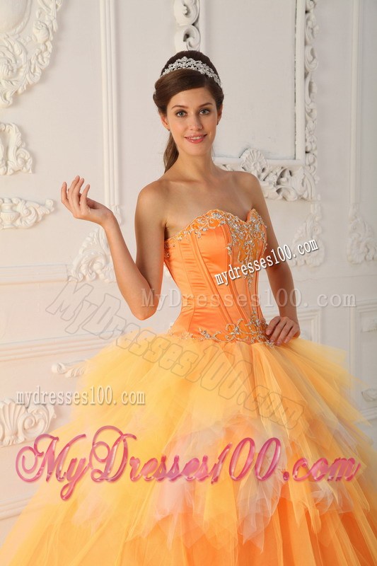 Orange A-line Appliques Decorate Quinceanera Dresses with Ruche and Layers