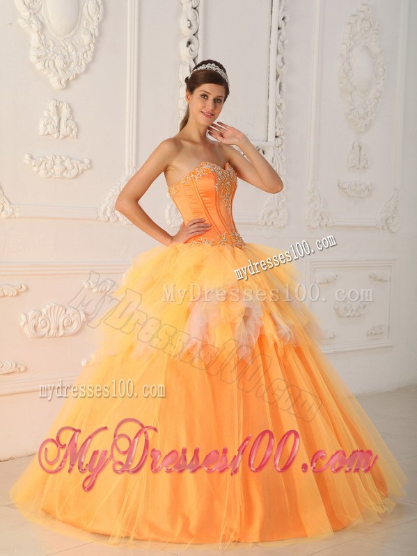 Orange A-line Appliques Decorate Quinceanera Dresses with Ruche and Layers