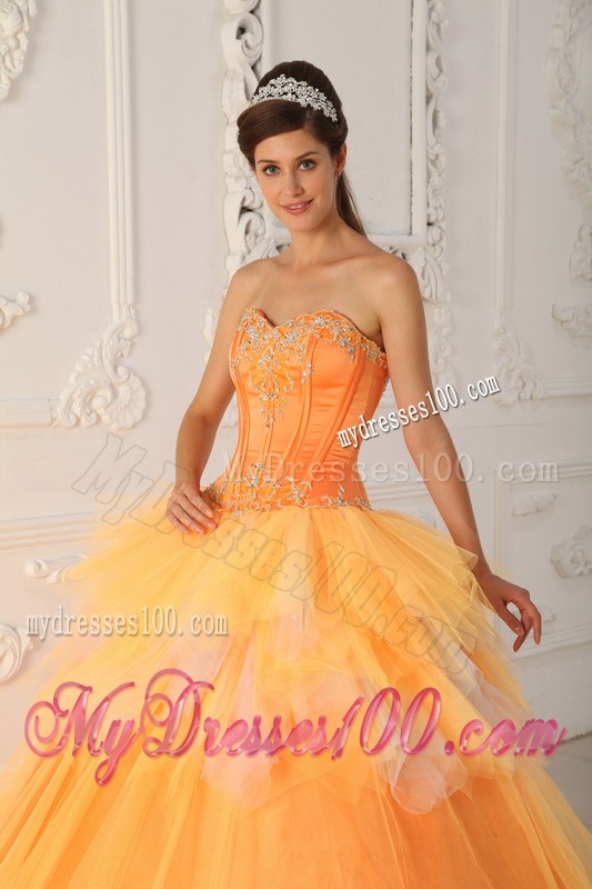 Orange A-line Appliques Decorate Quinceanera Dresses with Ruche and Layers